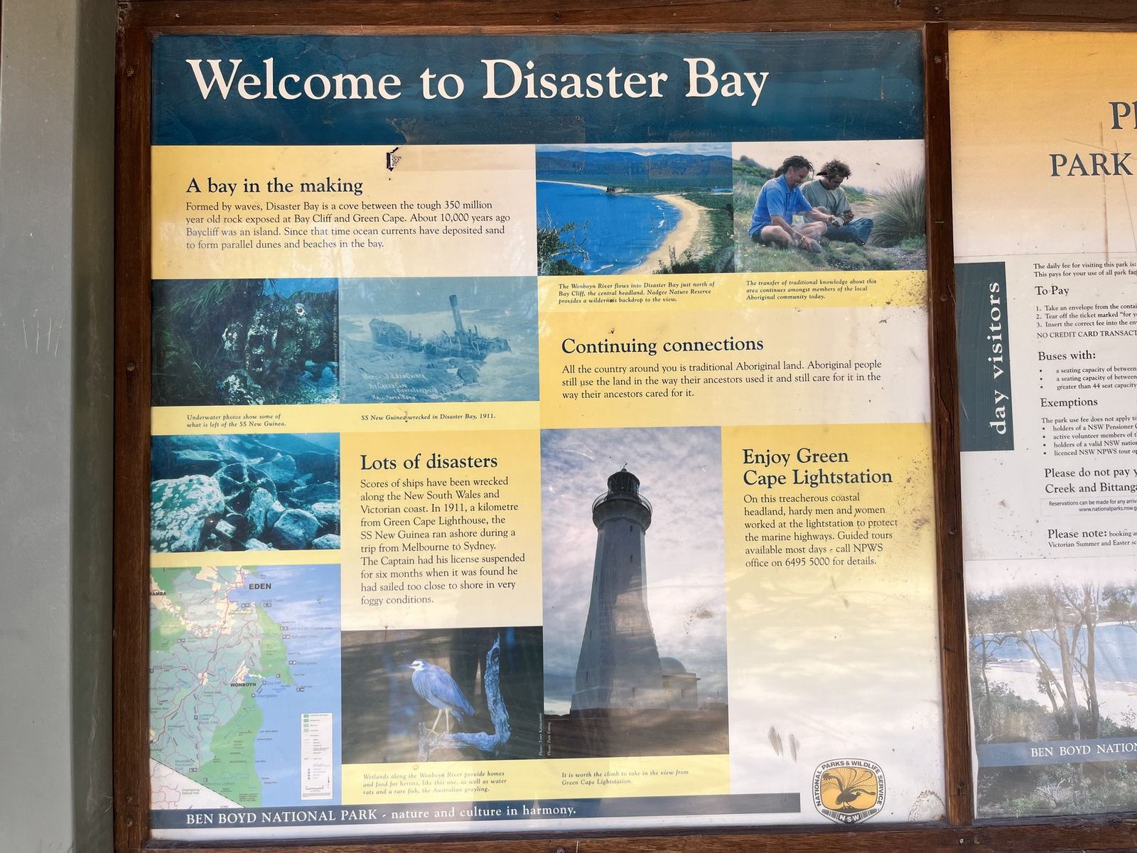 The national park interpretive sign headed Welcome to Disaster Bay, with maps and panels about shipwrecks and the lighthouse