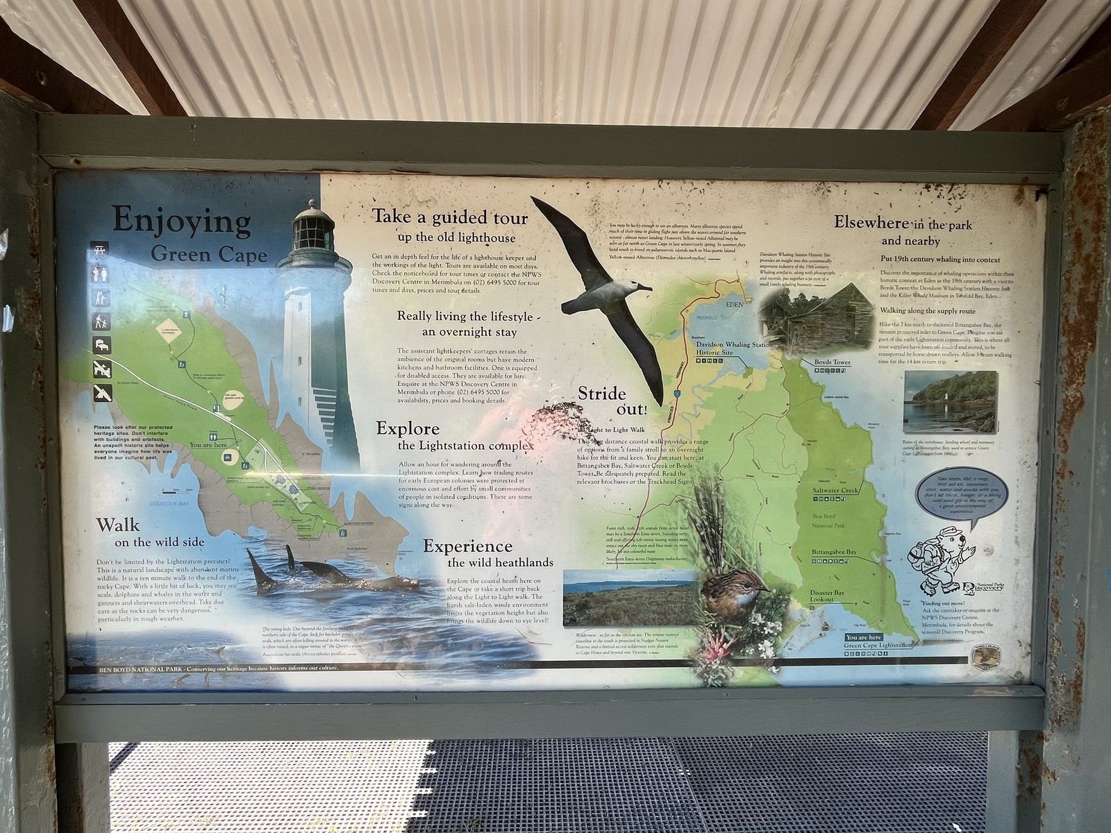 An interpretive sign about visiting Green Cape, with a map of the walks and the lightstation